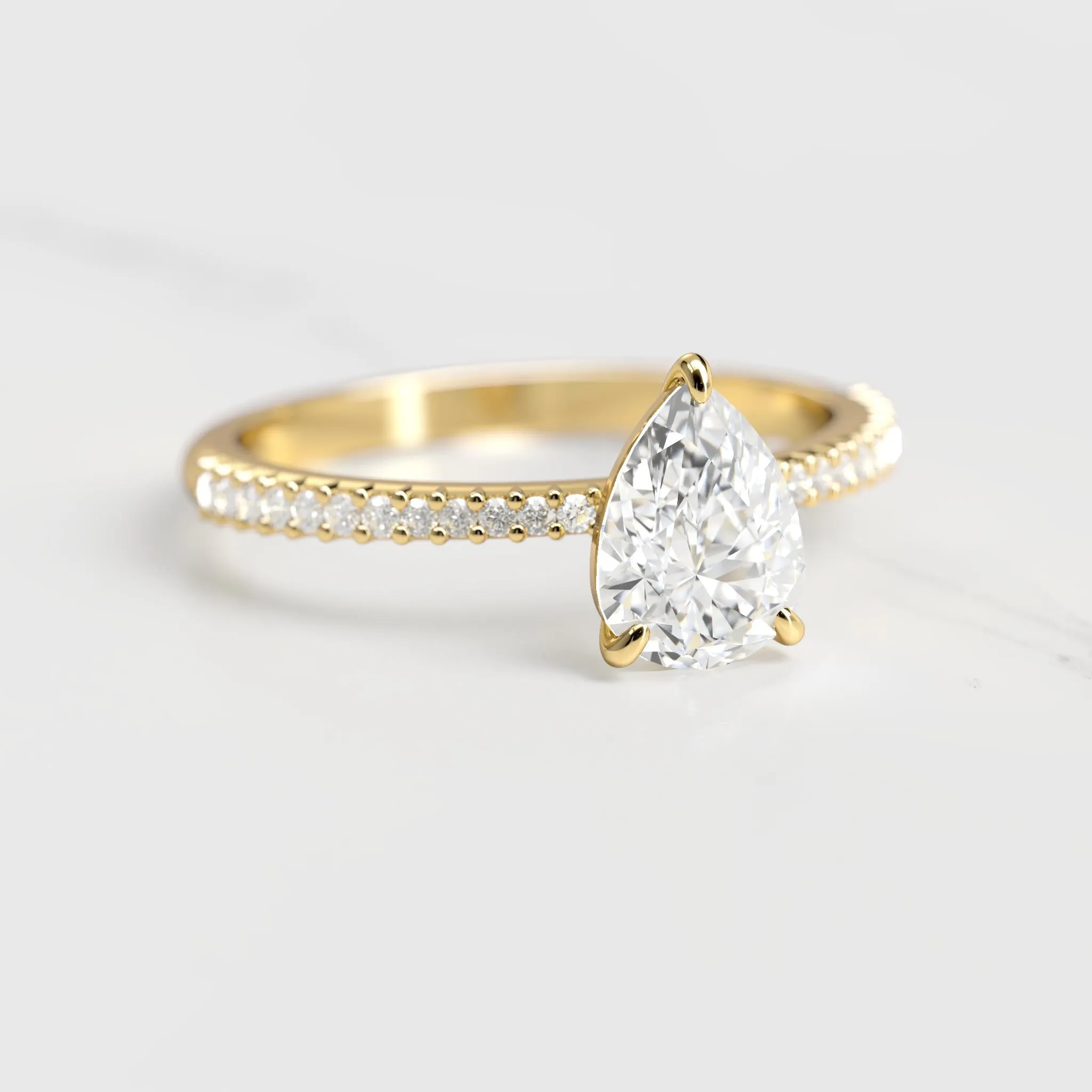 Pear Half Pave Tapered Diamond Ring