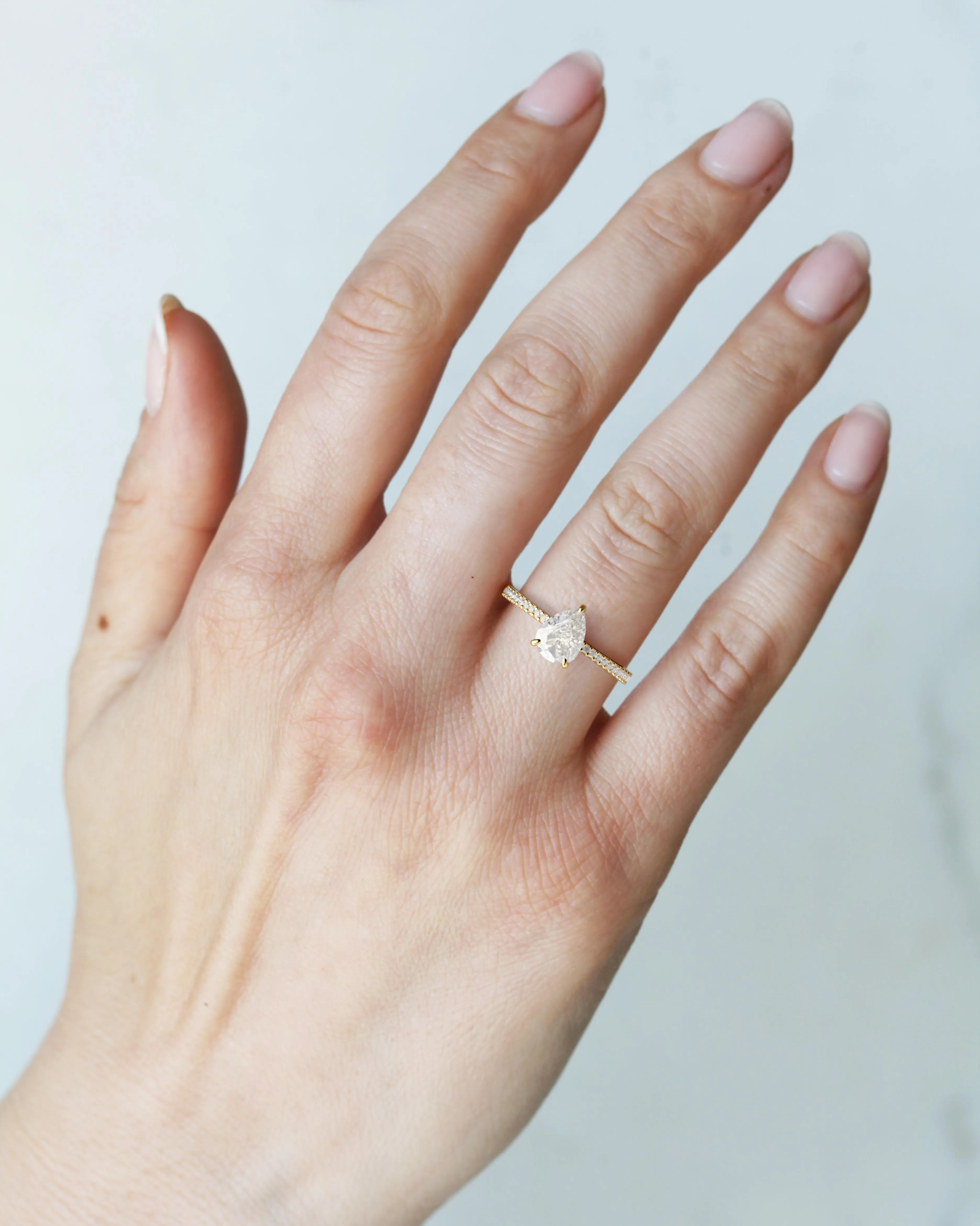 Pear Half Pave Tapered Diamond Ring