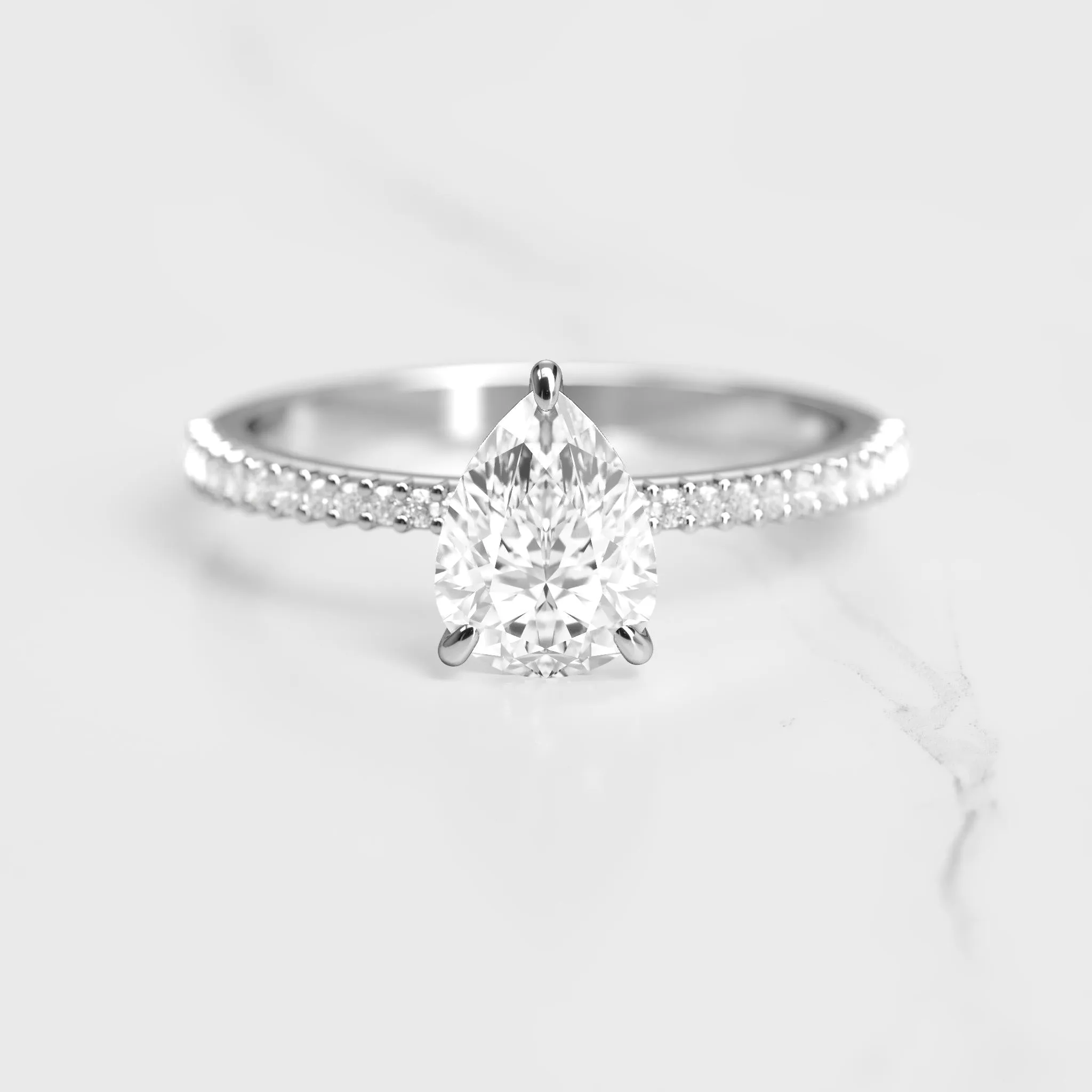 Pear Half Pave Tapered Diamond Ring