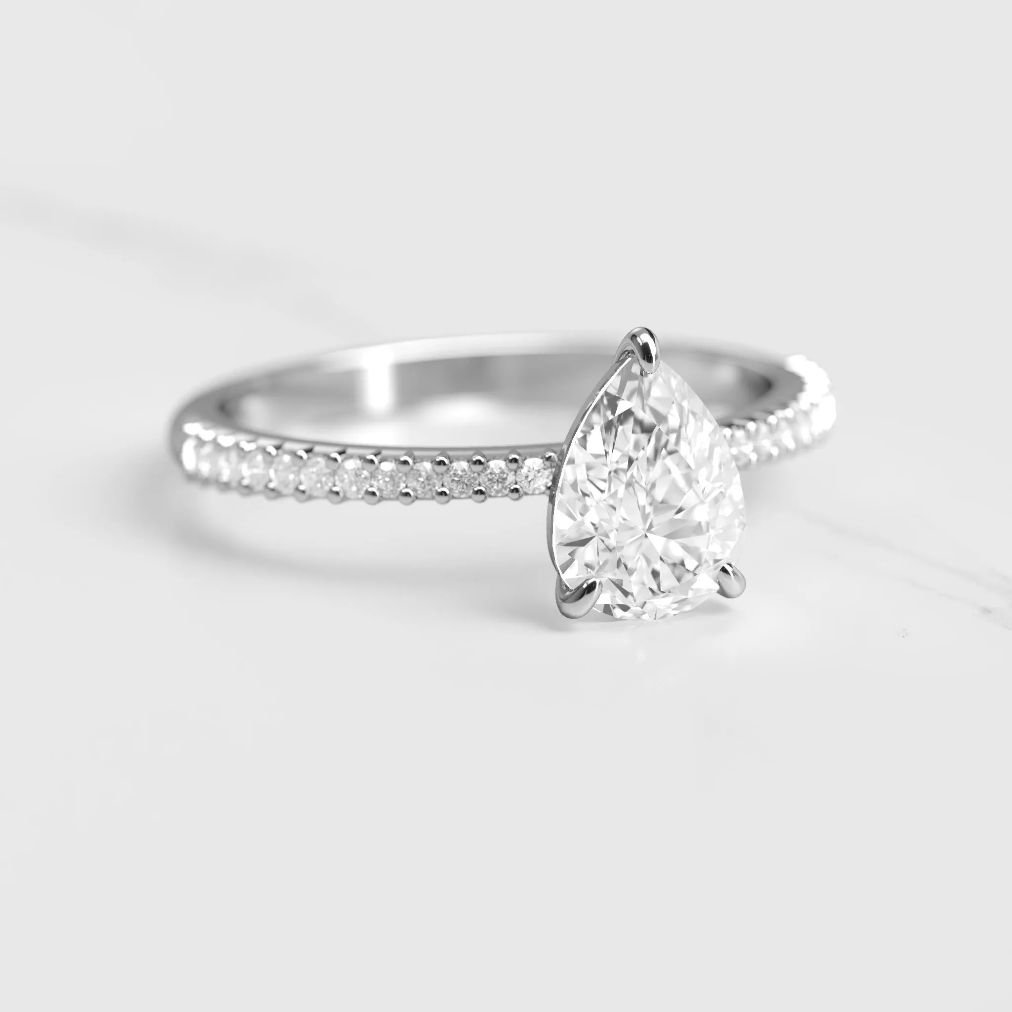 Pear Half Pave Tapered Diamond Ring